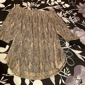 Tan with black blouse